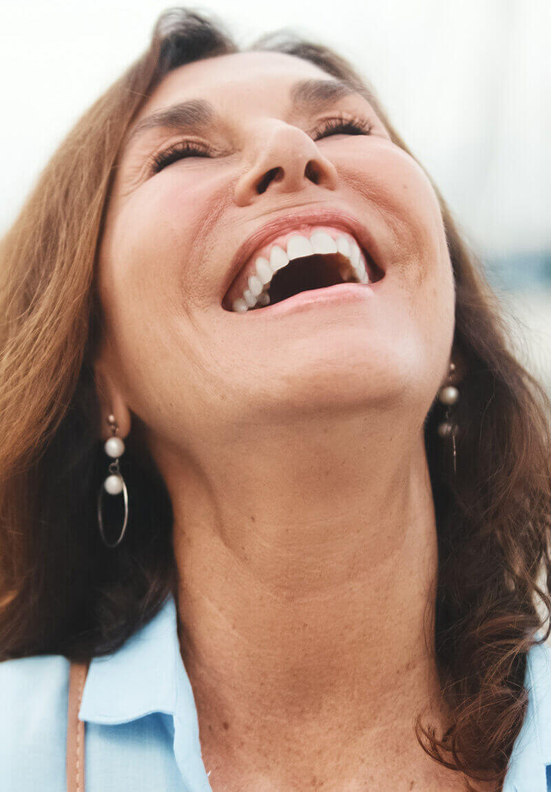 Mature woman laughing