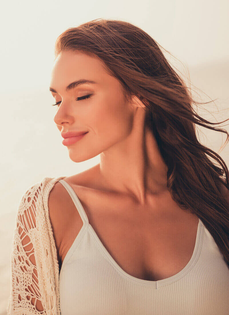 beautiful woman in white at the beach